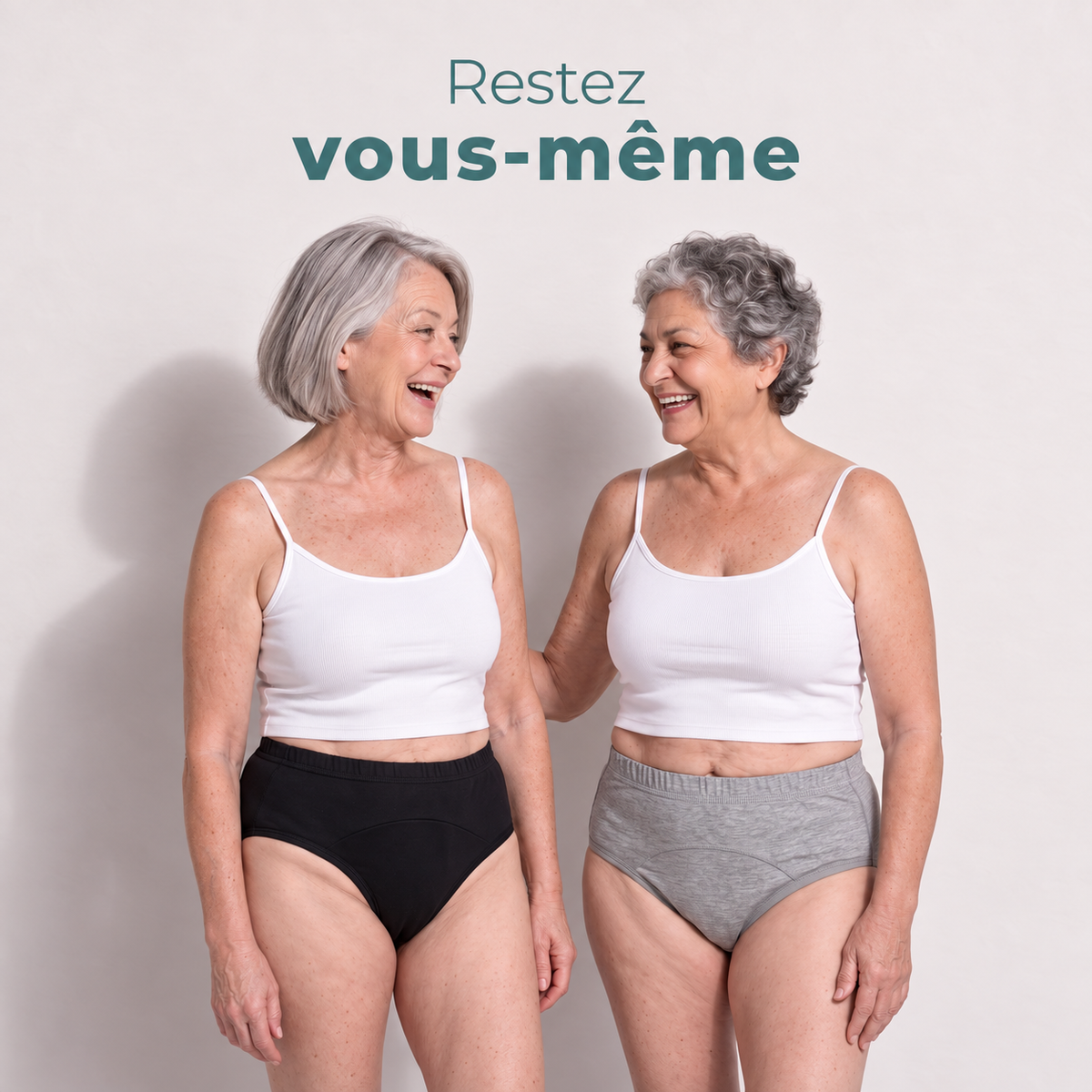 Deux femmes souriantes portant la culotte absorbante lavable Urikare, noire et grise, avec la signature Restez vous-même Image